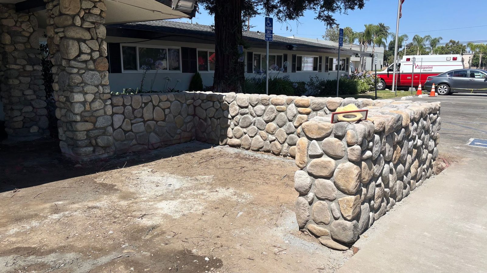 River-rock faced wall on a commercial property