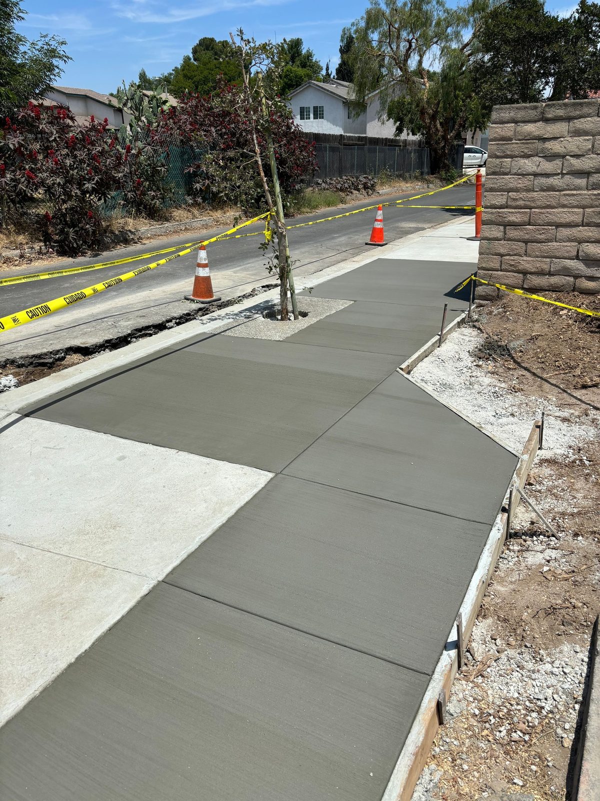 Commercial walkway pour along a building