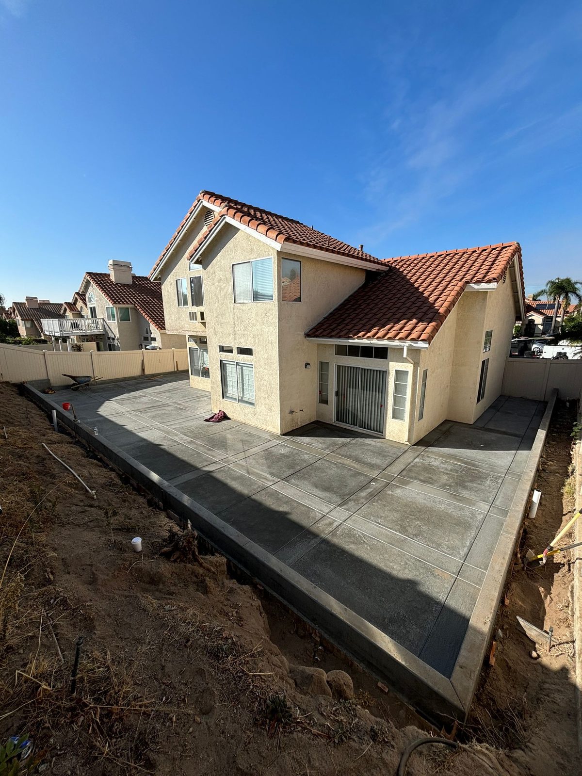 Finished slab and driveway at a two-story home