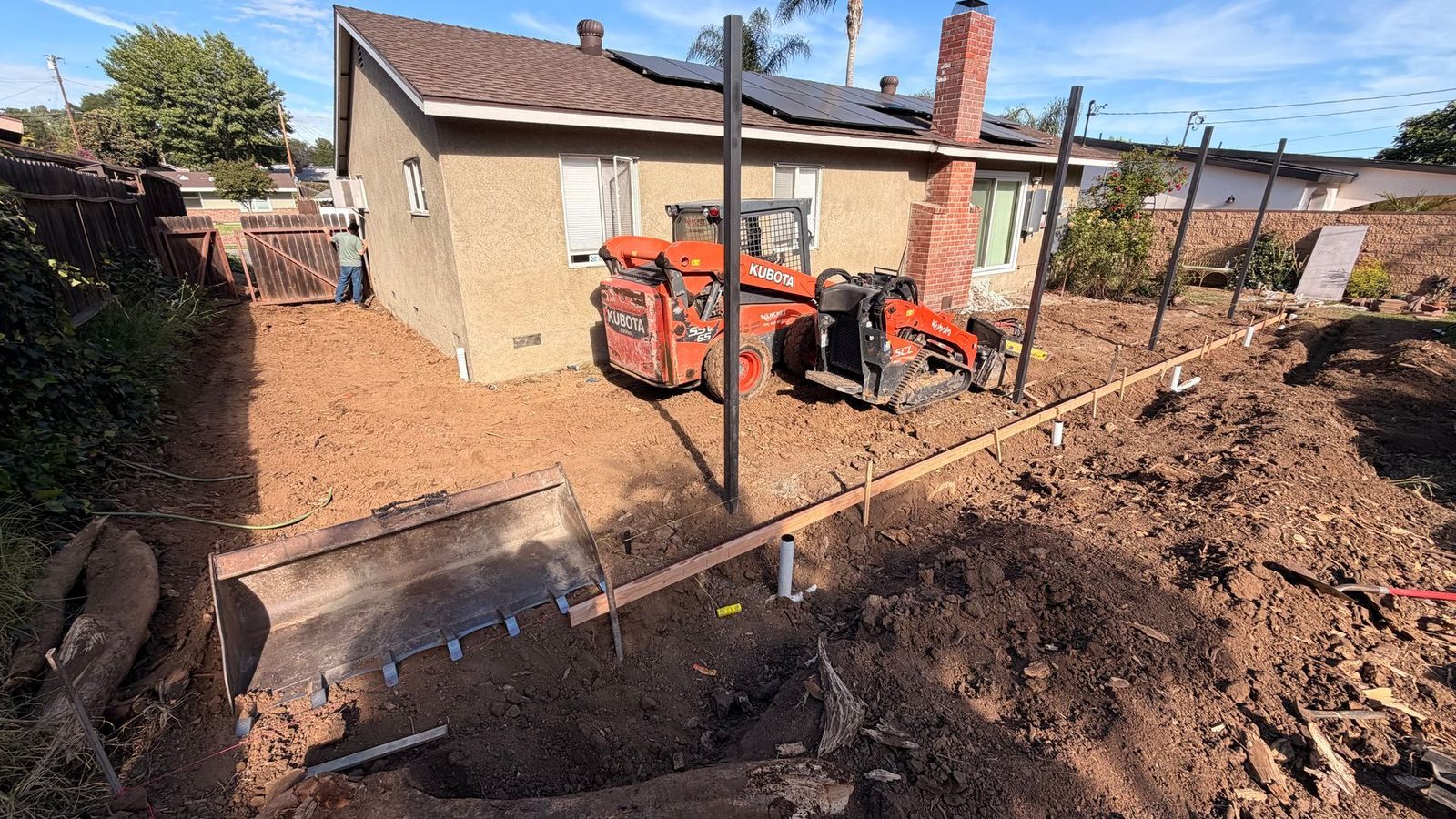 Setting grade stakes for a backyard slab