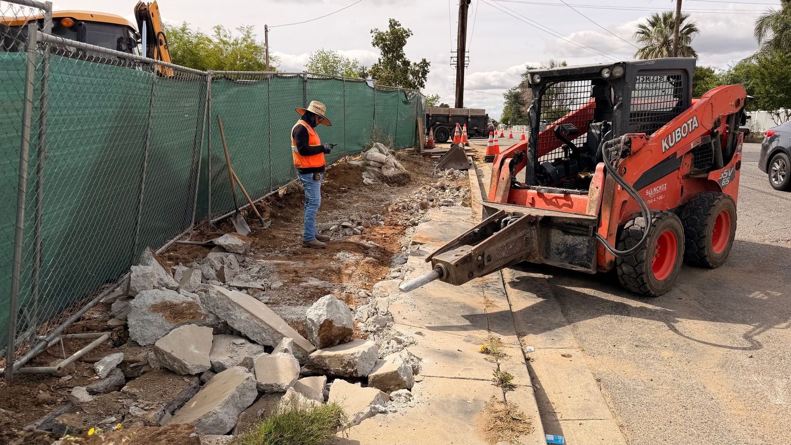 Curb and sidewalk demolition on a commercial site