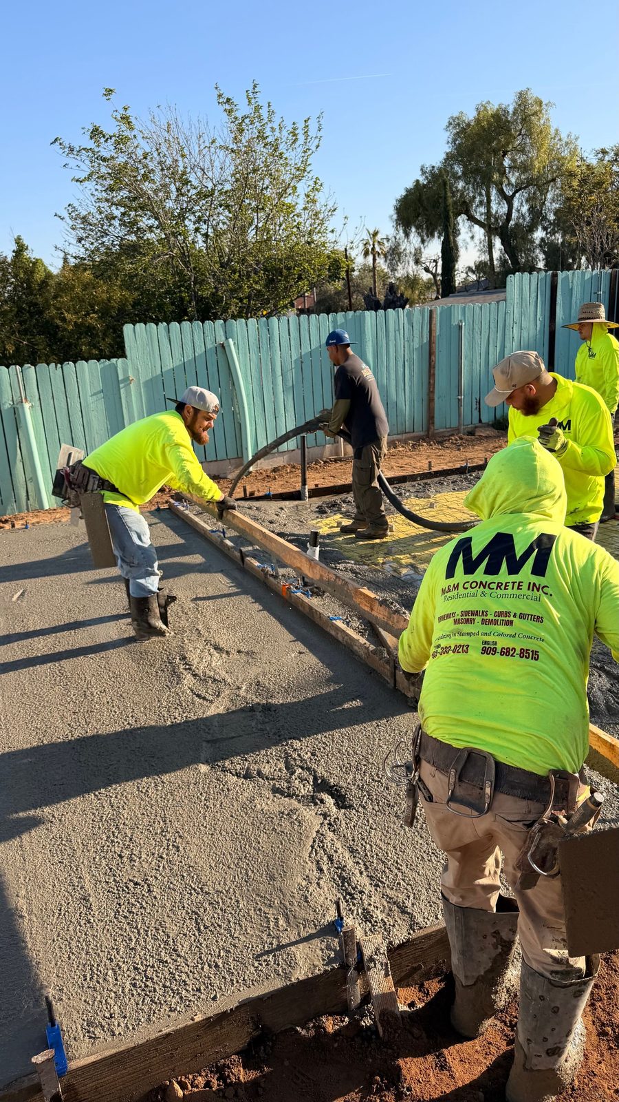 Screeding an ADU slab, Riverside